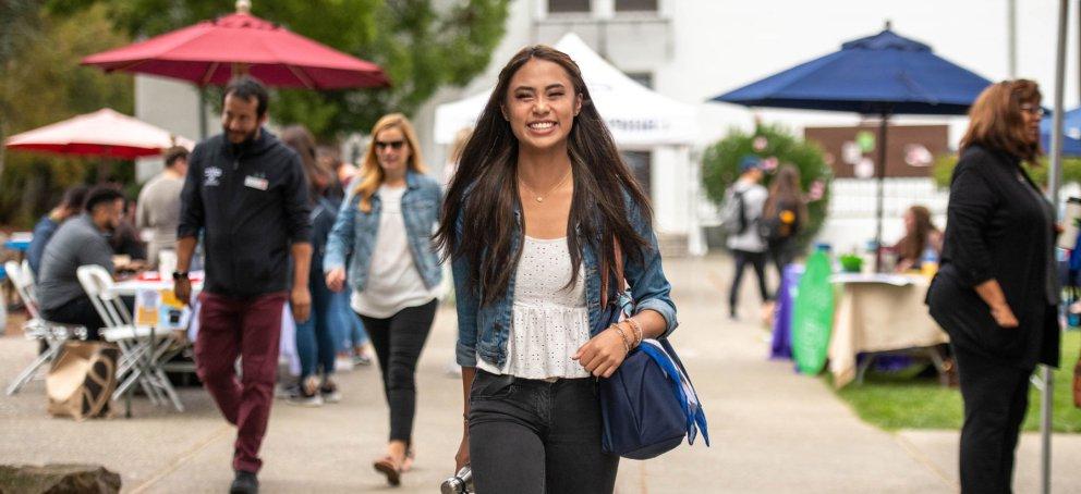 A student walking on Saint Mary's College Campus